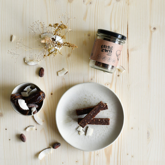 Barohni Kokos Riegel im Glas mit Kokosraspeln, Cashewkernen und Datteln – natürlicher Kokosriegel ohne Zuckerzusatz, handgemacht in der Schweiz